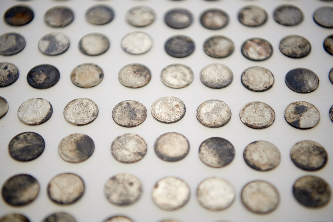 (Photo courtesy of The Church of Jesus Christ of Latter-day Saints) These coins were deposited in the capstone of the Salt Lake Temple on April 6, 1892. Some 400 coinsÑmostly nickels and dimes, some pennies, a few quartersÑhave been found inside the concrete.