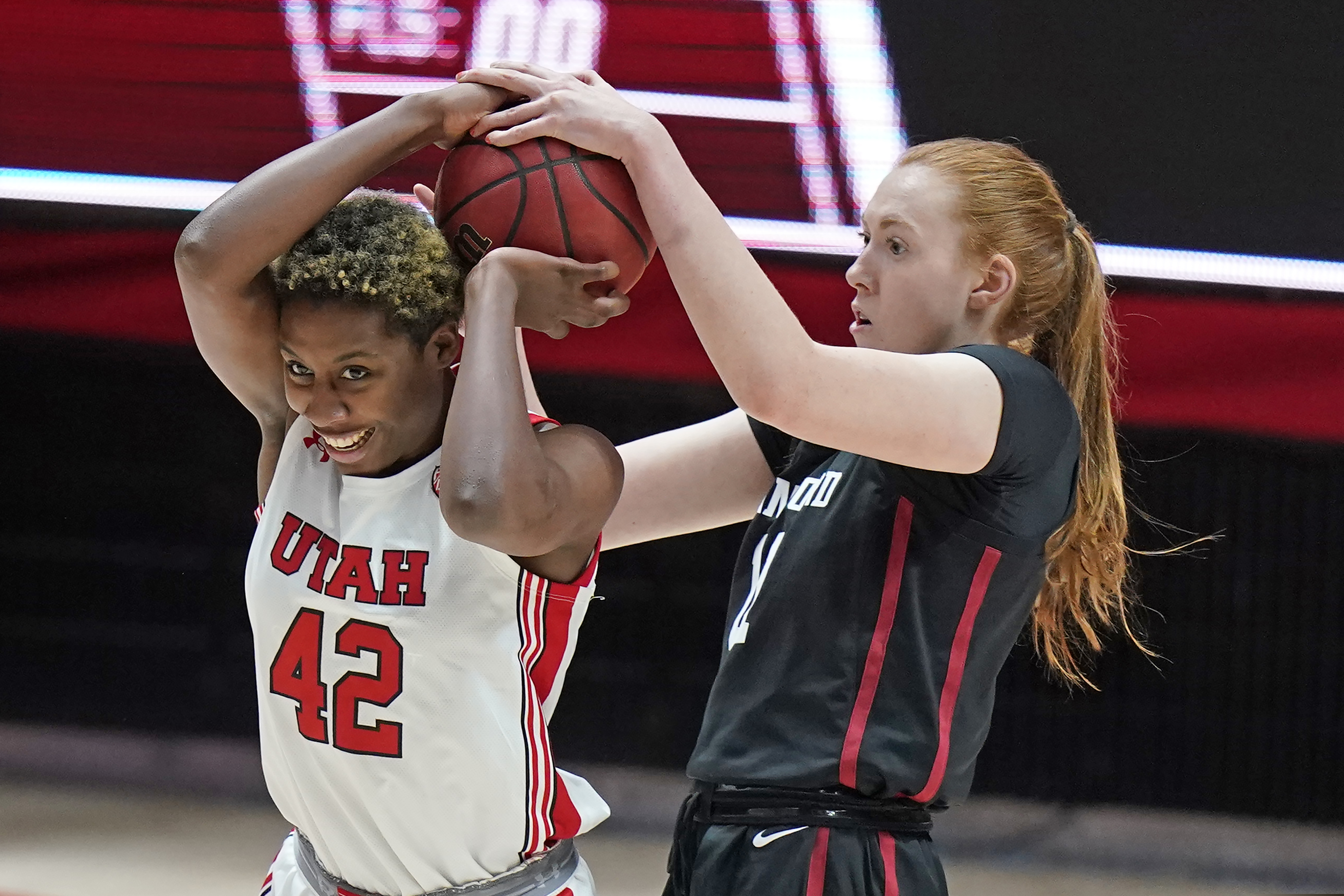 Stanford forward Ashten Prechtel (11) defends against Utah forward Peyton McFarland (42) in the first half during an NCAA college basketball game Friday, Jan. 15, 2021, in Salt Lake City. (AP Photo/Rick Bowmer)