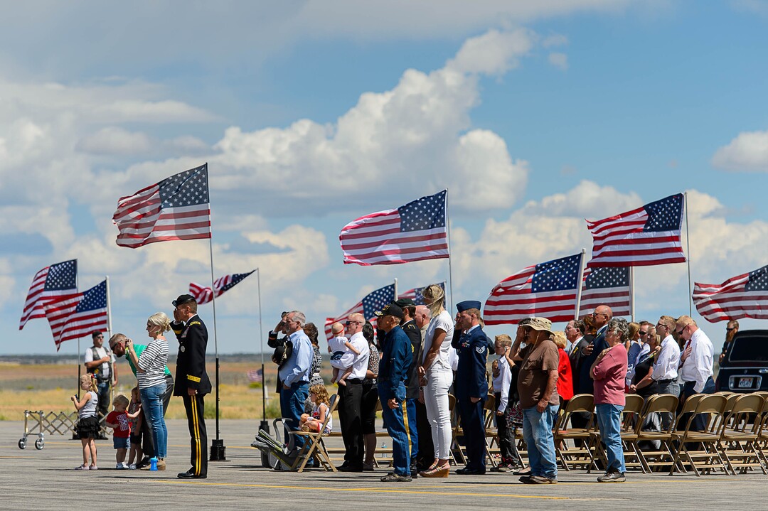 (Trent Nelson | The Salt Lake Tribune)  Family looks on as the body of fallen soldier Aaron Butler, who was killed last week in Afghanistan, arrives at the Monticello Airport, Thursday August 24, 2017.