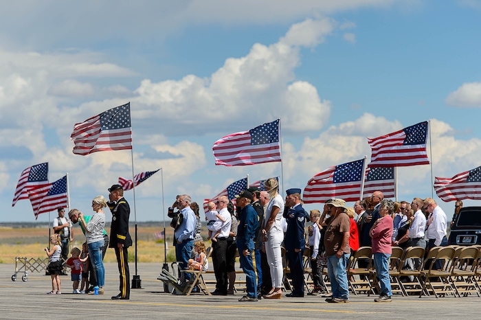 (Trent Nelson | The Salt Lake Tribune)  Family looks on as the body of fallen soldier Aaron Butler, who was killed last week in Afghanistan, arrives at the Monticello Airport, Thursday August 24, 2017.