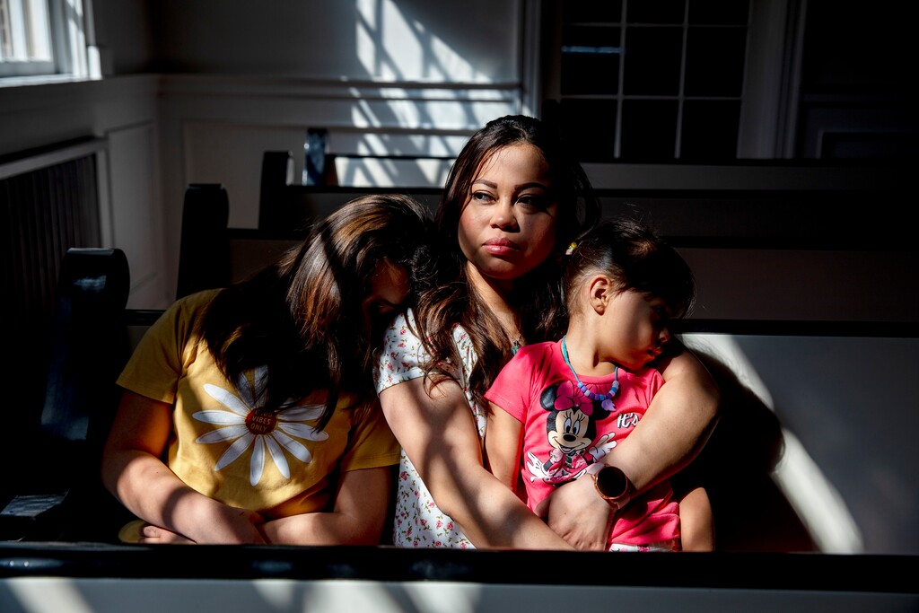 (Kim Raff | The New York Times) Vicky Chavez and her daughters at First Unitarian Church in Salt Lake City, Utah, April 2, 2021.