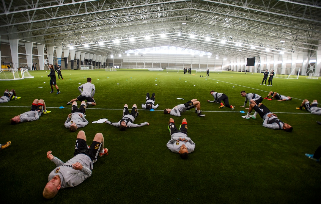 (Steve Griffin  |  The Salt Lake Tribune) RSL players stretch before practice begins at the Zions Bank Real Academy indoor facility in Herriman Tuesday January 23, 2018.