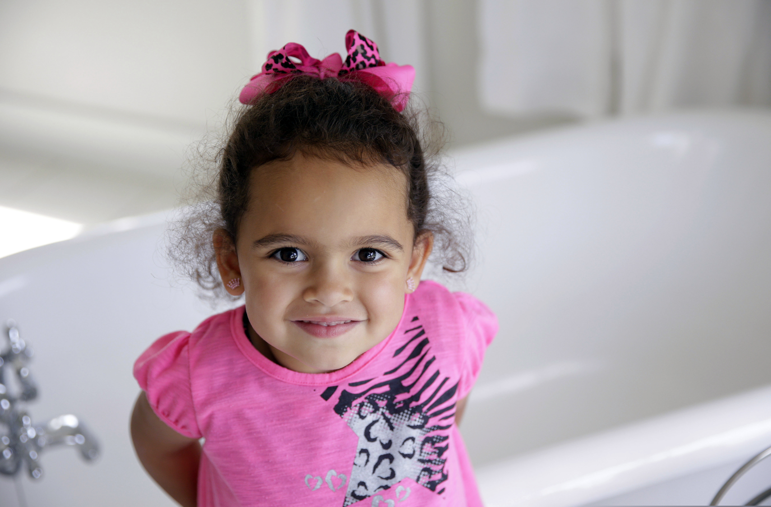 (Mike Simons/Tulsa World via AP, File) In this Aug. 6, 2013, file photo, Veronica, 3, a child at the center of an international adoption dispute at the time, smiles in a bathroom of the Cherokee Nation Jack Brown Center in Tahlequah, Okla. A federal law that gives preference to Native American families in child welfare proceedings involving Native children is facing a significant legal challenge. In 2013, the U.S. Supreme Court ruled the law didn’t apply in a South Carolina case involving Veronica because her Cherokee father was absent from part of her life.