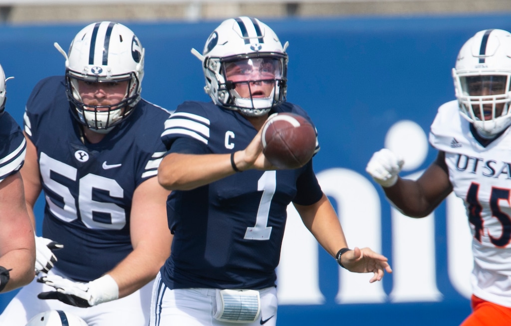 (Rick Egan  |  The Salt Lake Tribune)   Brigham Young Cougars quarterback Zach Wilson (1)  tosses a shovel pass to Brigham Young Cougars tight end Masen Wake (13), in football action between the Brigham Young Cougars and the UTSA Roadrunners, at Lavell Edwards stadium, Saturday, Oct. 10, 2020.