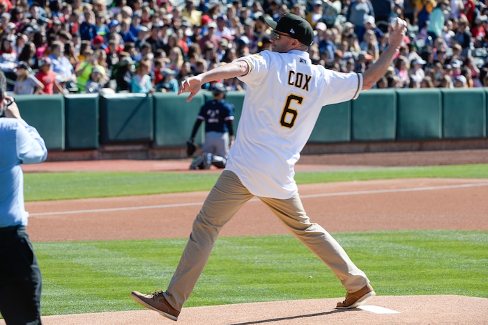 (Francisco Kjolseth  |  The Salt Lake Tribune)  Lt. Governor Spencer Cox delivers one of the first pitches before the start of the Bee's game against the Rainiers during the staging of their annual kids day game at Smith's Ballpark in Salt Lake on Thursday, May 2, 2019. .