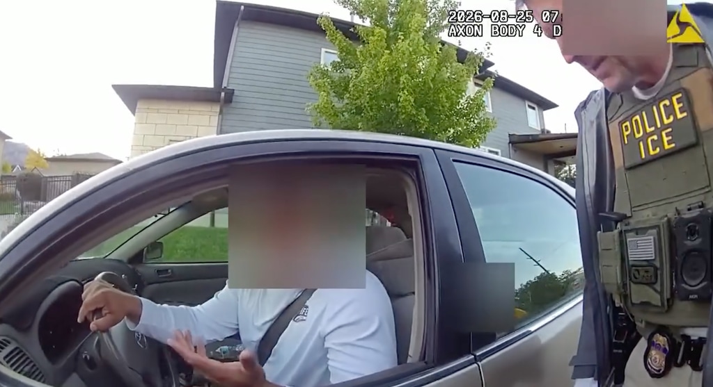 (Ogden Police Department) Body camera footage shows an Ogden police officer present while a U.S. Immigration and Customs Enforcement agent prepares to arrest a man in Ogden, Tuesday, Aug. 25, 2026.