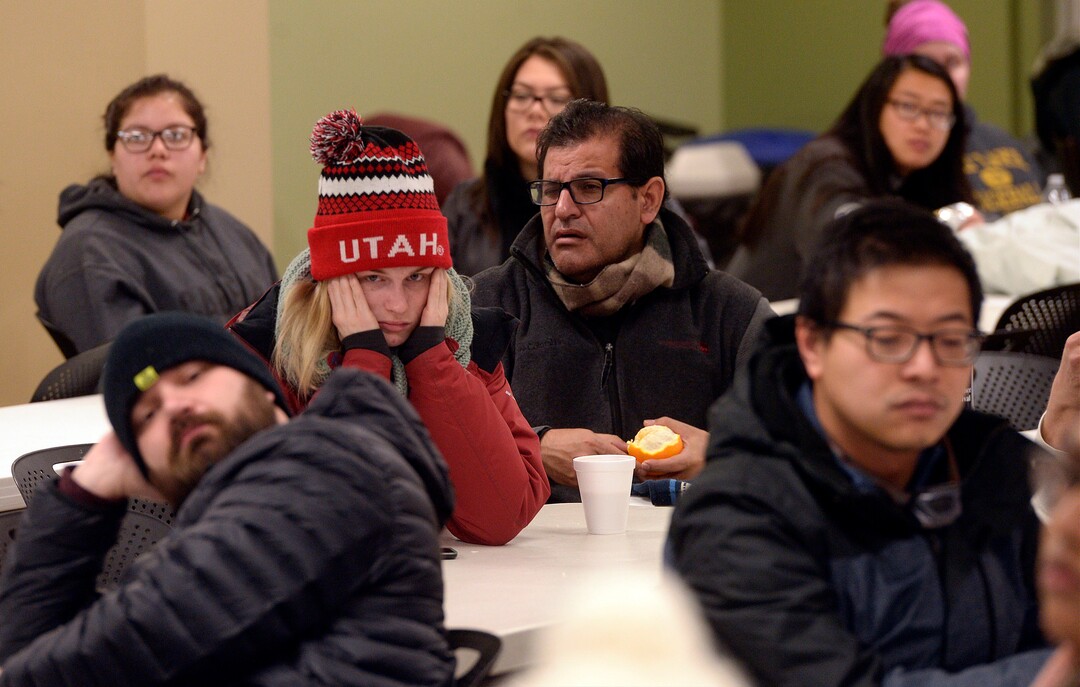 (Al Hartmann  |  The Salt Lake Tribune)  Dozens of volunteers dressed for the cold wait to get their assignments at 3:45 a.m Thursday, Jan. 25, 2018,  for the annual Point In Time count of homeless people in Salt Lake City.
