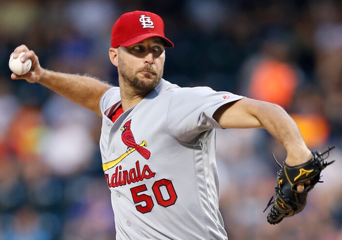St. Louis Cardinals starting pitcher Adam Wainwright winds up during the first inning of a baseball game Monday, July 17, 2017, in New York. (AP Photo/Kathy Willens)