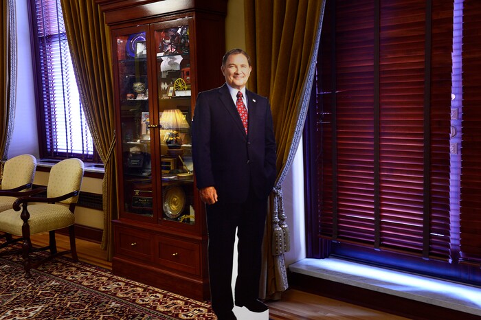 Scott Sommerdorf | The Salt Lake Tribune
Only a cardboard cutout of Utah Governor Gary Herbert was in his offices when Marlene Jennings, a former delegate for Gary Herbert when he ran for Governor came to give her shirt back over the issue of the inland port and SB234, Thursday, March 14, 2018.