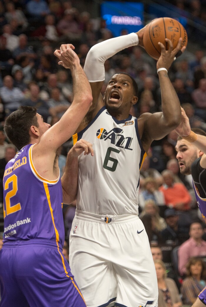 (Rick Egan  |  The Salt Lake Tribune) Utah Jazz forward Joe Johnson (6) shoots over Sydney Kings forward Todd Blanchfield (12), in preseason basketball Utah Jazz vs.Sydney Kings, in Salt Lake City, Sunday, October 2, 2017.


