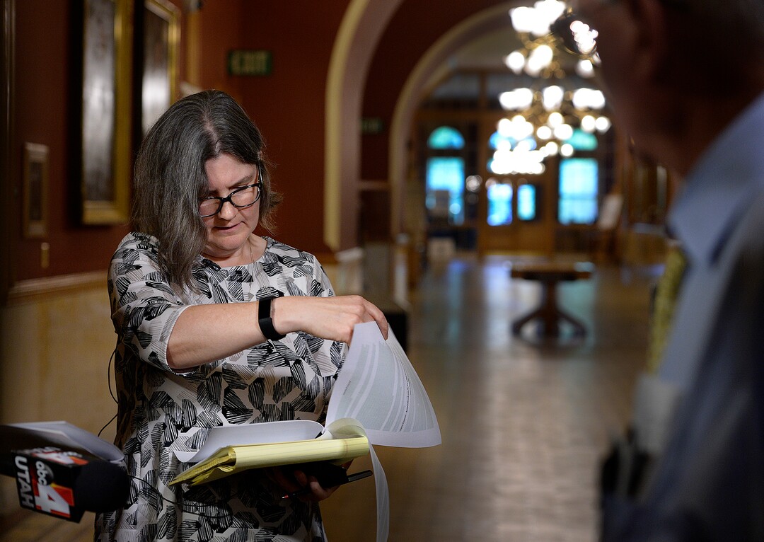 (Scott Sommerdorf   |  The Salt Lake Tribune)   Karra Porter, attorney for Nurse Alex Wubbels, looks over the document provided by the Mayor's office prior to responding to the findings that were laid out in that announcement. Salt Lake City Mayor Jackie Biskupski announces that findings have been made, and that they have been given to SLCPD Chief Mike Brown. He will now decide the fate of the two officers involved in the Nurse Wubbels arrest, Wednesday, September 13, 2017.