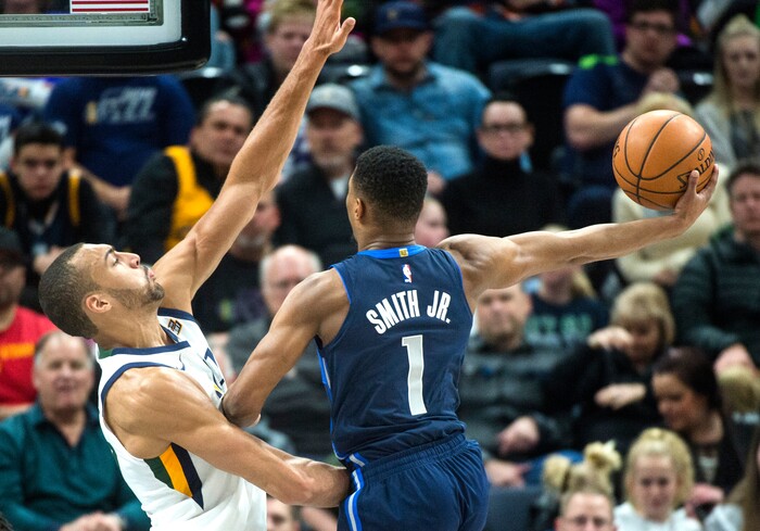 (Rick Egan  |  The Salt Lake Tribune)     Dallas Mavericks guard Dennis Smith Jr. (1) takes the ball to the hoop, as Utah Jazz center Rudy Gobert (27) defends, in NBA action between Utah Jazz and Dallas Mavericks in Salt Lake City, Saturday, Feb. 24, 2018.