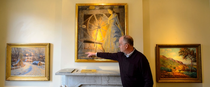 (Steve Griffin  |  The Salt Lake Tribune) Dave Ericson with three of 11 historic Utah paintings that he will be selling in a private sealed bid auction for the Logan City School District. The paintings are on display at Dave Ericson Fine Art in Salt Lake City.