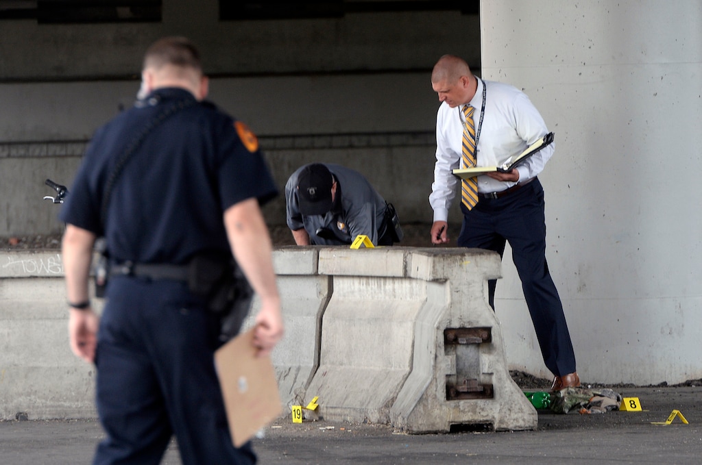 Al Hartmann | The Salt Lake Tribune
Salt Lake City police investigate homicide-assault crime scene near 500 S. 500 W. Tuesday July 25.