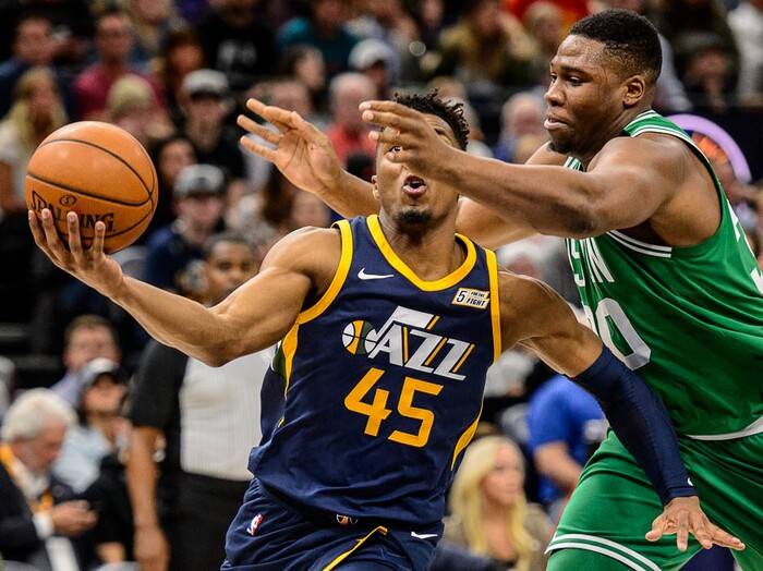 (Trent Nelson | The Salt Lake Tribune)  
Utah Jazz vs. Boston Celtics, NBA basketball in Salt Lake City, Wednesday March 28, 2018. Utah Jazz guard Donovan Mitchell (45) and Boston Celtics forward Guerschon Yabusele (30).
