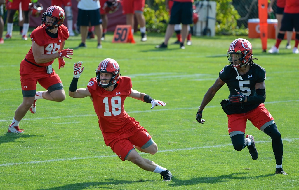 (Francisco Kjolseth  |  The Salt Lake Tribune) Utah cornerback Tareke Lewis (5), shown covering Britain Covey during a 2018 practice, is listed No. 1 on the depth chart at his position in the 2019 preseason camp.