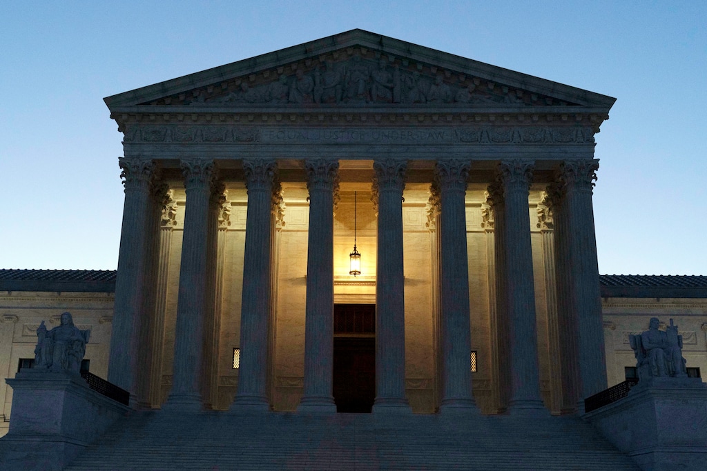 (Jose Luis Magana | AP) The U.S. Supreme Court is seen before sunrise on Capitol Hill in Washington, March. 21, 2022.