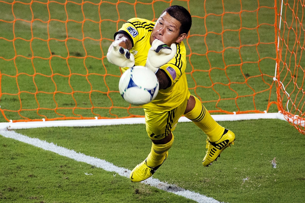 Real Salt Lake goalkeeper Nick Rimando makes a save on a penalty kick by Houston Dynamo midfielder Brad Davis during an MLS soccer match, Thursday, Sept. 6, 2012, in Houston. Houston won 1-0. (AP Photo/Houston Chronicle, Smiley N. Pool) MANDATORY CREDIT