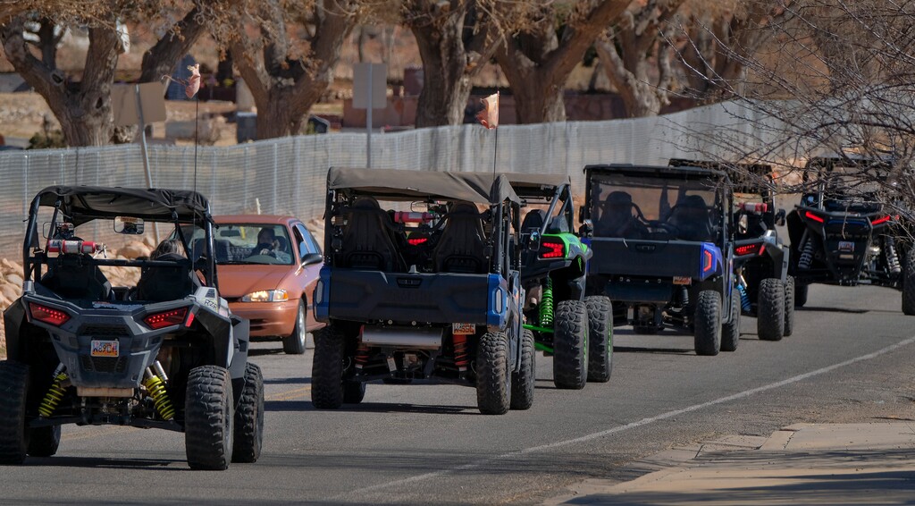 (Leah Hogsten | The Salt Lake Tribune) Several off-road utility terrain vehicles (UTVs) motor up Sand Flats Road  towards the Sand Flats Recreation Area trail, located just 4 miles from downtown Moab, Feb. 19, 2021. 