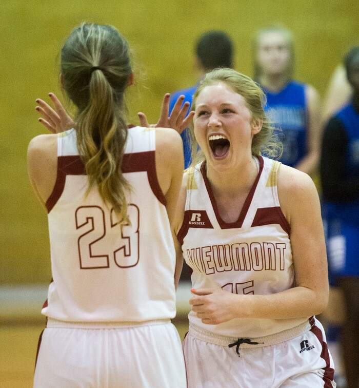 (Rick Egan  |  The Salt Lake Tribune)   Karli Gunnell and Anna MacKay (15) celebrate Viewmont High's last second victory over Bingham, in prep basketball action in Bountiful, Wednesday, January 3, 2018.