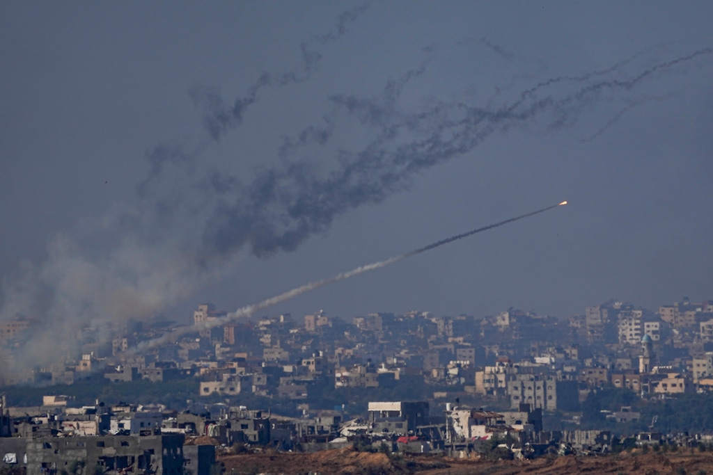 (Ariel Schalit | AP) Rockets are fired toward Israel from the Gaza Strip, as seen from southern Israel, Friday, Dec. 1, 2023.