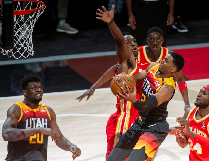 (Rick Egan | The Salt Lake Tribune) Utah Jazz guard Shaquille Harrison (8) takes the ball to the hoop, in NBA action between the Utah Jazz and the Atlanta Hawks at Vivint Arena, on Friday, Jan. 15, 2021.