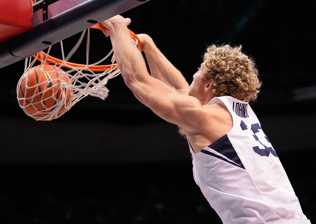 (Francisco Kjolseth | The Salt Lake Tribune) Brigham Young Cougars forward Caleb Lohner (33) dunks the ball in WCC basketball action between the Brigham Young Cougars and the Portland Pilots, at the Marriott Center, on Saturday, January 22, 2022.