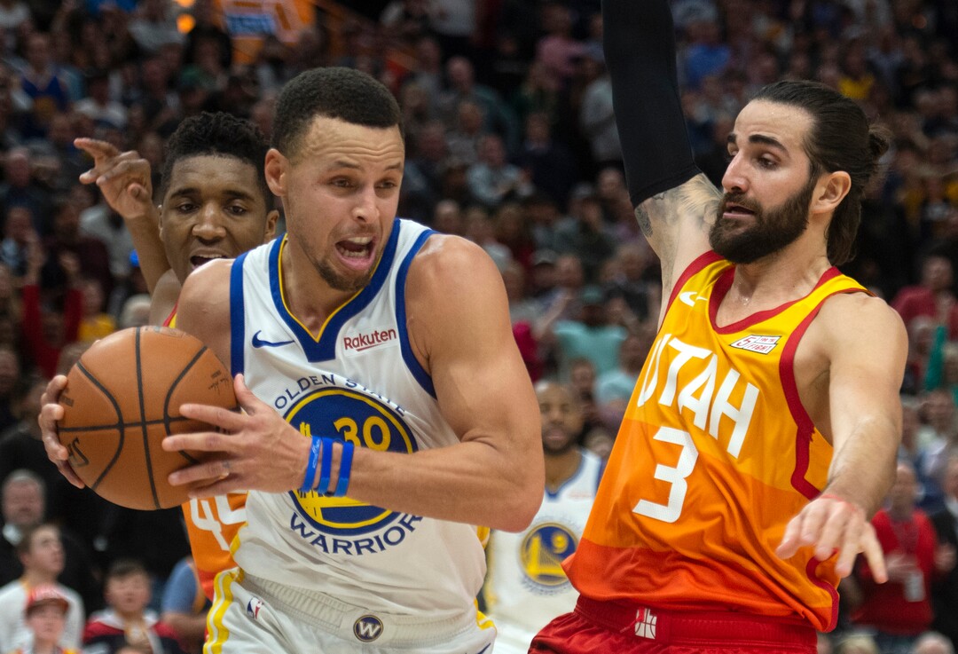 (Rick Egan  |  The Salt Lake Tribune)    Golden State Warriors guard Stephen Curry (30) drives with the ball, as Utah Jazz guard Ricky Rubio (3) defends, in NBA action between Utah Jazz and Golden State Warriors, in Salt Lake City, Wednesday, Dec. 19, 2018.