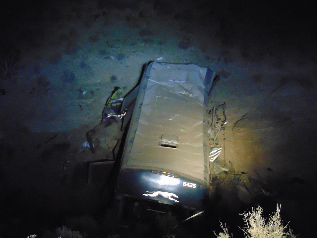 (Photo courtesy the Utah Highway Patrol) A 13-year-old died after a Greyhound bus crashed into a steep wash in Emery County on New Year's Eve 2017. A second passenger has sued the Greyhound bus company and a driver who authorities say fell asleep before the bus careened off a road in the Utah desert two years ago, killing one person and injured 12 others.