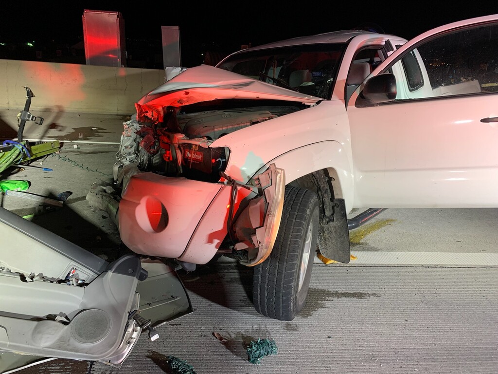 (Utah Department of Public Safety) A photo of the pickup truck that struck a car stopped in an emergency lane, killing one person and critically injuring another.