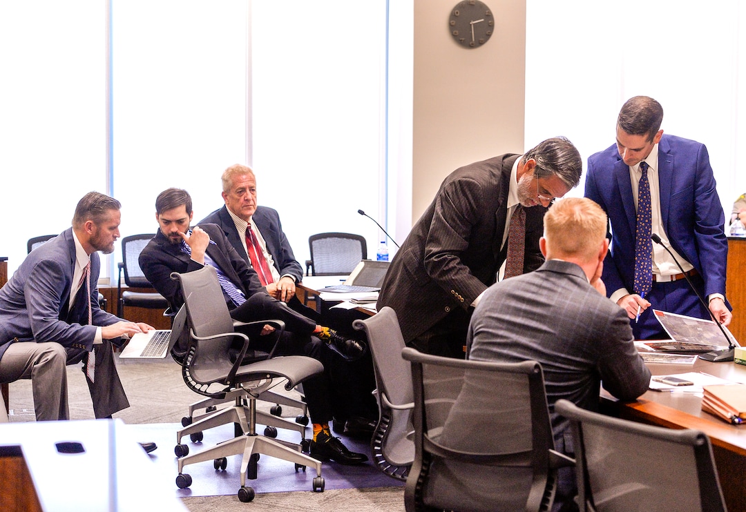 (Leah Hogsten  |  The Salt Lake Tribune) l-r Private investigator, Chris Bertram, defense attorney Corey Riley, defendant Robert Lyman, defense attorney Andrew Deiss, prosecuting attorney Chad Dotson and prosecuting attorney Shane Klenk confer during LymanÕs preliminary hearing.  Robert Lyman was bound over for trial and pleaded not guilty to charges of reckless burning and burning during a closed fire season before Judge James Brady in Fourth District Court in Provo, Utah, July 30, 2019. Lyman is accused of starting the June 17, 2017 that burned 71,000 acres and cost an estimated $35 million to fight.Ê