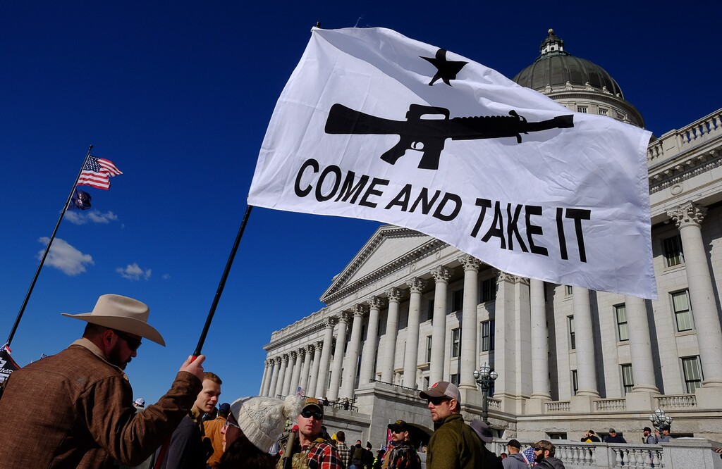 (Francisco Kjolseth | Tribune file photo) Cade Lightfoot, left, of Toole joins hundreds of pro gun proponents gathered at the Utah Capitol in Salt Lake City on Saturday, Feb. 8, 2020, in response to recent proposals from legislators, including red-flag laws, universal background checks and the elimination of private transfers.