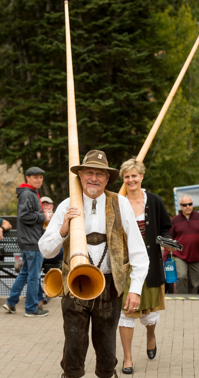 (Rick Egan  |  The Salt Lake Tribune)     Tony Brazelton and Babe Blattner carried their Alphorns to the tram, during the Oktoberfest celebration at Snowbird. Sunday, Sept. 30, 2018.