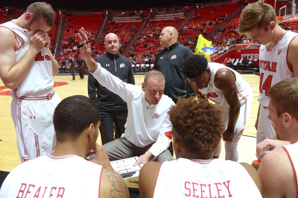 (Leah Hogsten | The Salt Lake Tribune) Utah Utes head coach Larry Krystkowiak celebrates his seventh season during the Utah men's and women's basketball teams, Night with the Utes, Tuesday, Oct. 17, at the Jon M. Huntsman Center.