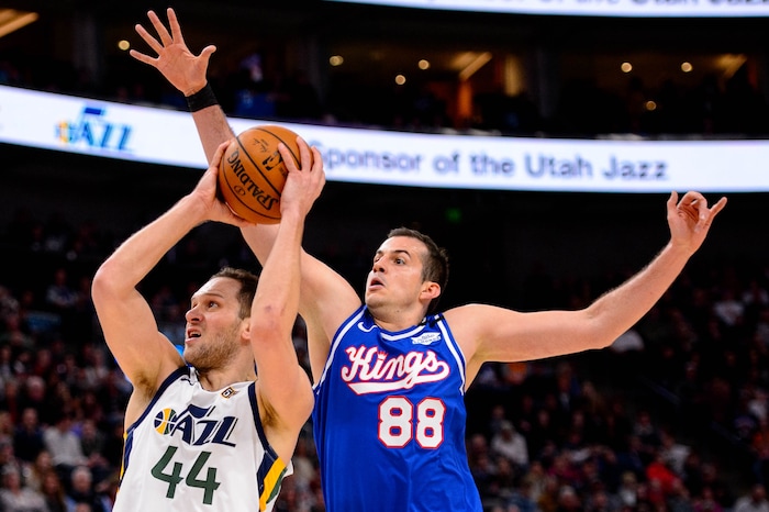 (Trent Nelson  |  The Salt Lake Tribune) Utah Jazz forward Bojan Bogdanovic (44) shoots, defended by Sacramento Kings forward Nemanja Bjelica (88) as the Utah Jazz host the Sacramento Kings, NBA basketball in Salt Lake City on Saturday, Jan. 18, 2020.