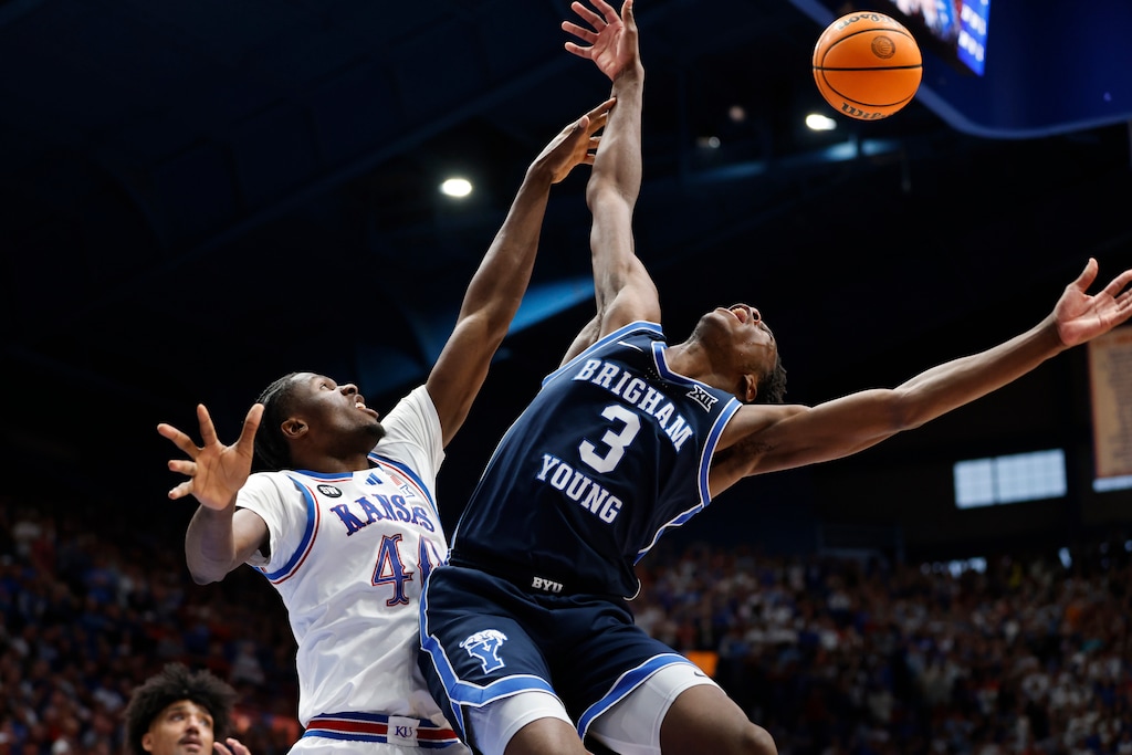 Kansas forward Flory Bidunga (40) blocks a shot by BYU forward AJ Dybantsa (3) during the second half of an NCAA college basketball game, Saturday, Jan. 31, 2026, in Lawrence, Kan. (AP Photo/Colin E. Braley)