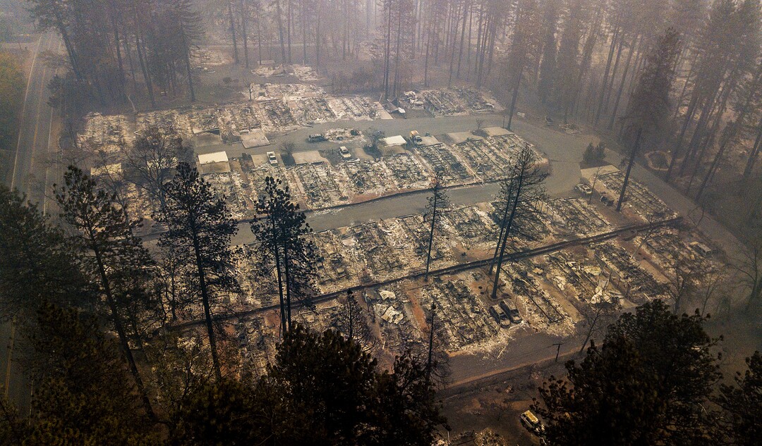 Residences leveled by the wildfire line a neighborhood in Paradise, Calif., on Thursday, Nov. 15, 2018. The California Department of Forestry and Fire Protection said Thursday the wildfire that destroyed the town of Paradise is now 40 percent contained, up from 30 percent Wednesday morning.  (AP Photo/Noah Berger)