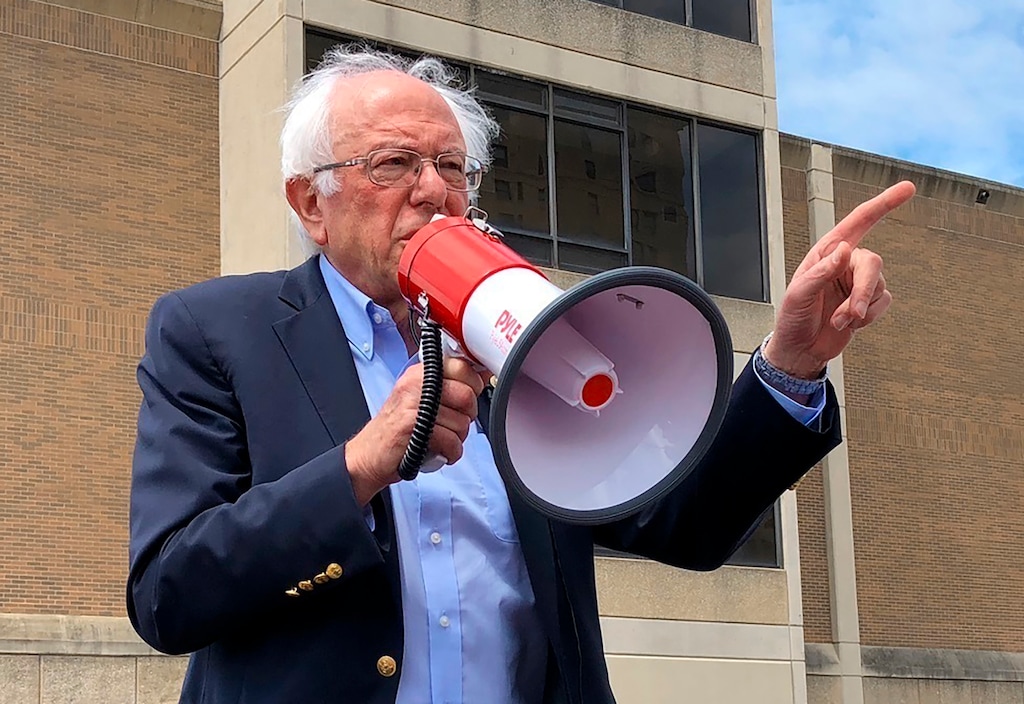 Democratic presidential candidate Bernie Sanders speaks to striking telecommunications workers on Sunday, Aug. 25, 2019, in Louisville, Ky. Sanders says it’s possible to be a friend of coal miners and a believer in climate change and the need for cleaner energy sources to combat it. (AP Photo/Bruce Schreiner)
