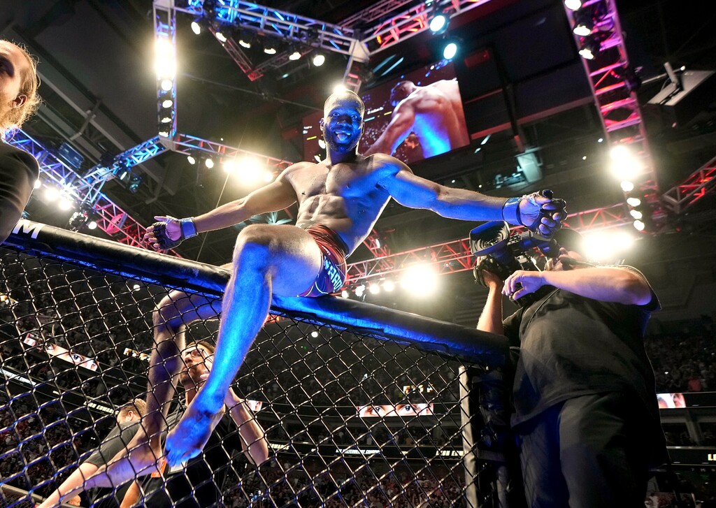 (Francisco Kjolseth | The Salt Lake Tribune) UFC fighter Leon Edwards, of Jamaica, celebrates his title as welterweight champion of the world after knocking out Nigerian UFC fighter Kamaru Usman during the UFC 278 mixed martial arts title bout in Salt Lake City on Saturday, Aug. 20, 2022.
