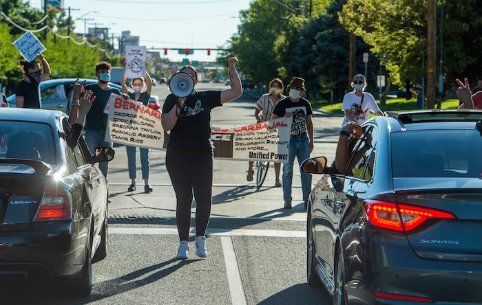 (Rick Egan  |  The Salt Lake Tribune) Protesters stop traffic as they march down 400 South in Salt Lake City during a demonstration for Bernardo Palacios-Carbajal on Monday, June 22, 2020.
