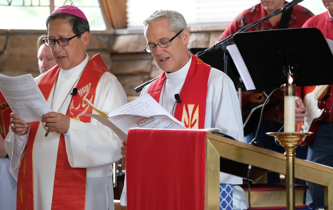 (Francisco Kjolseth  |  The Salt Lake Tribune)  Catholic Bishop Oscar Solis, left, and Lutheran Bishop Jim Gonia, gather at the Zion Lutheran Church in Salt Lake for a celebration of dialogue and relationship for an ecumenical prayer service. 