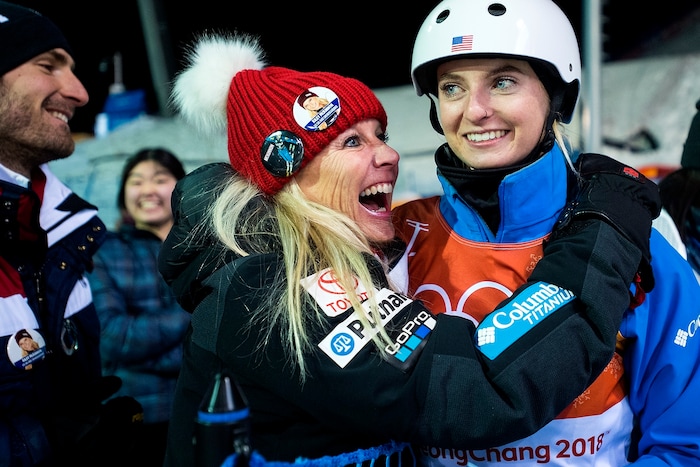 (Chris Detrick  |  The Salt Lake Tribune)  USA Kiley McKinnon celebrates with her mom Allison McKinnon after qualifying for finals the during the Ladies' Aerials Qualification at Phoenix Park during the Pyeongchang 2018 Winter Olympics Thursday, Feb. 15, 2018.  