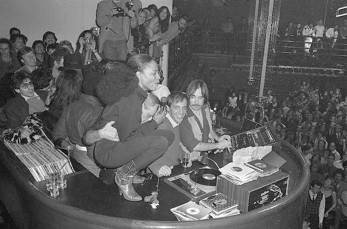 (  |  courtesy Sundance Institute) Diana Ross squats on a DJ booth, in an image from Matt Tyrnauer's "Studio 54," a documentary about the illustrious New York disco. The movie will screen in the Documentary Premieres program of the 2018 Sundance Film Festival.