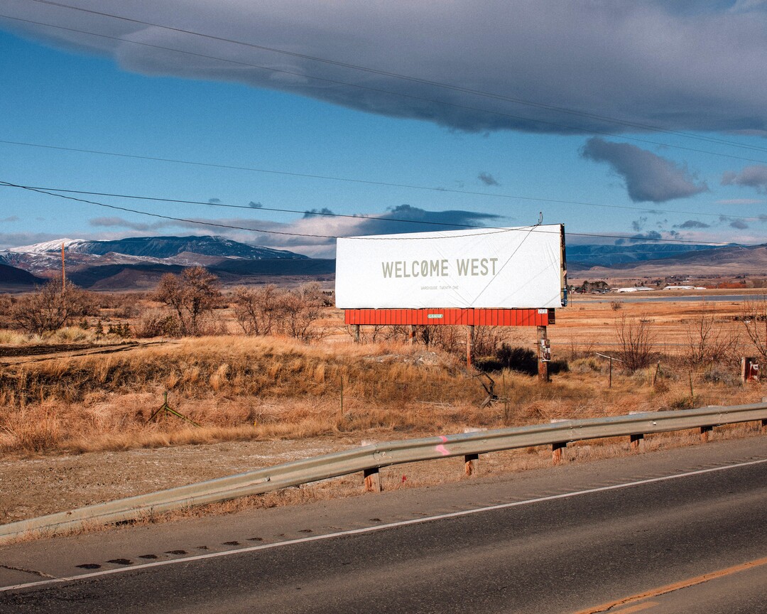 (Elliot Ross | The New York Times) A billboard on the south end of Cody, Wyo., greets travelers on their way into town, on Jan. 28, 2020. Last September, The Cody Enterprise reported that Kanye West bought a property called Monster Lake Ranch, about eight miles outside Cody.