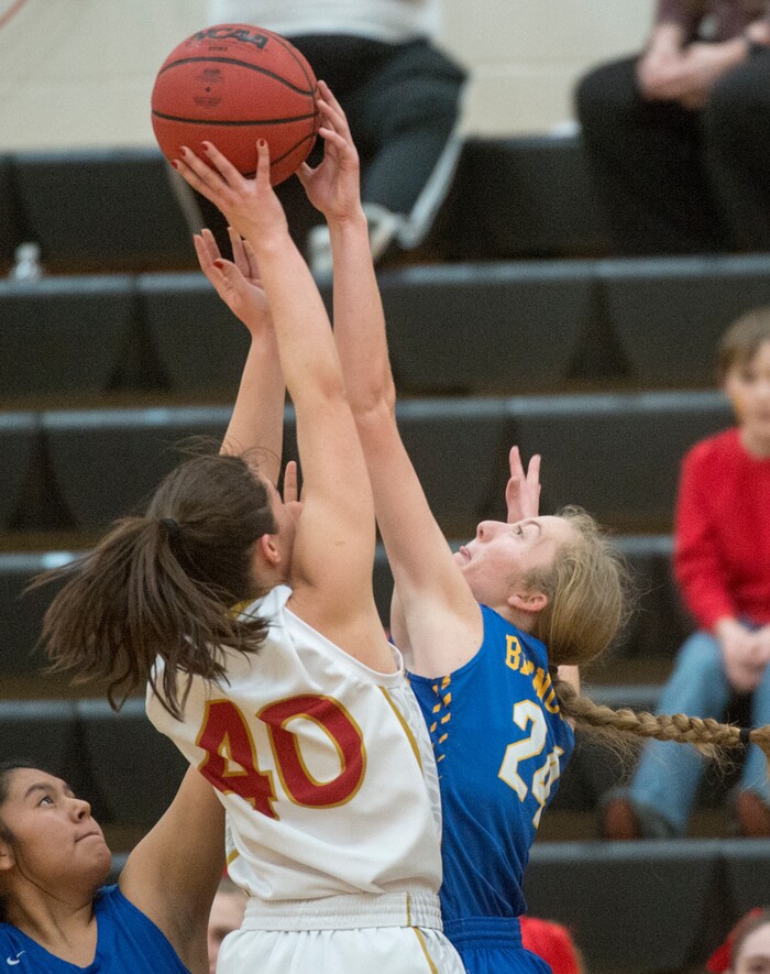 (Rick Egan  |  The Salt Lake Tribune)   Judge Memorial forward, Victoria Garcia (40) takes a shot as San Juan forward Madi Palmer (24) defends, in 3A Women's basketball State playoff action Judge Memorial Vs. San Juan, in Heber City, Friday, Feb. 16, 2018.