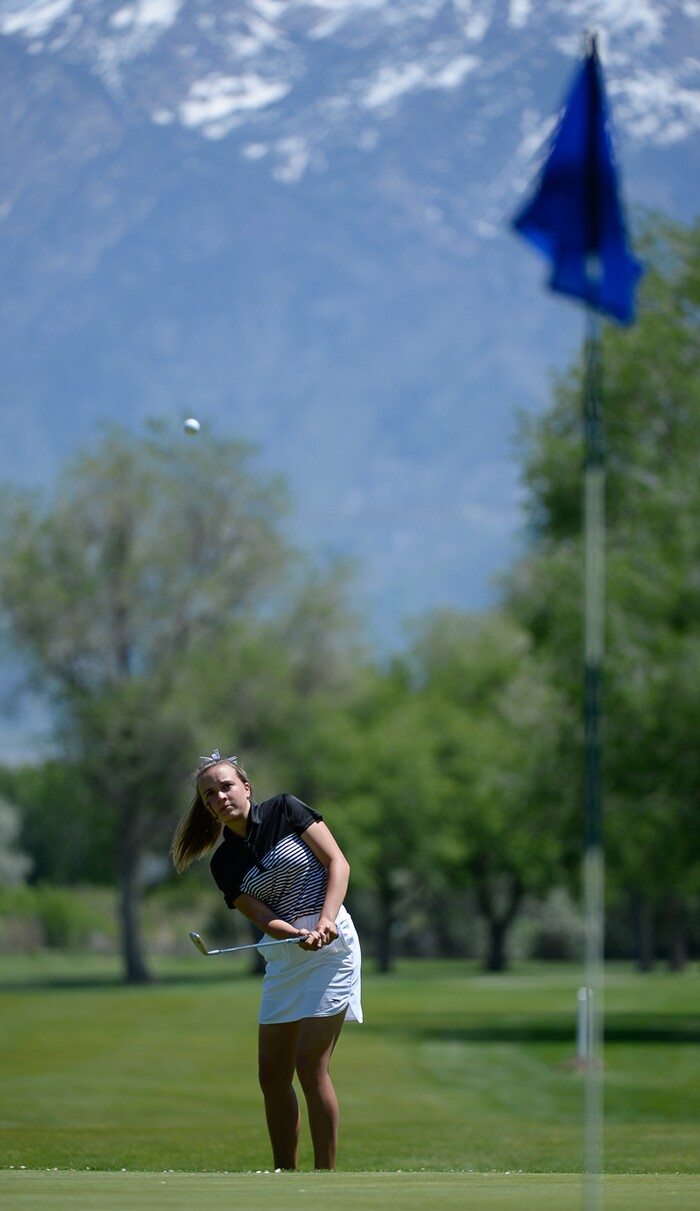 (Francisco Kjolseth  |  The Salt Lake Tribune)  Caylyn Ponich of Davis eyes her ball on hole 16 on day two of the Class 6A girls' golf state tournament at Meadow Brook Golf Course in Taylorsville on Tuesday, May 15, 2018. Ponich went on to take 3rd in the individual title and second with her team. 