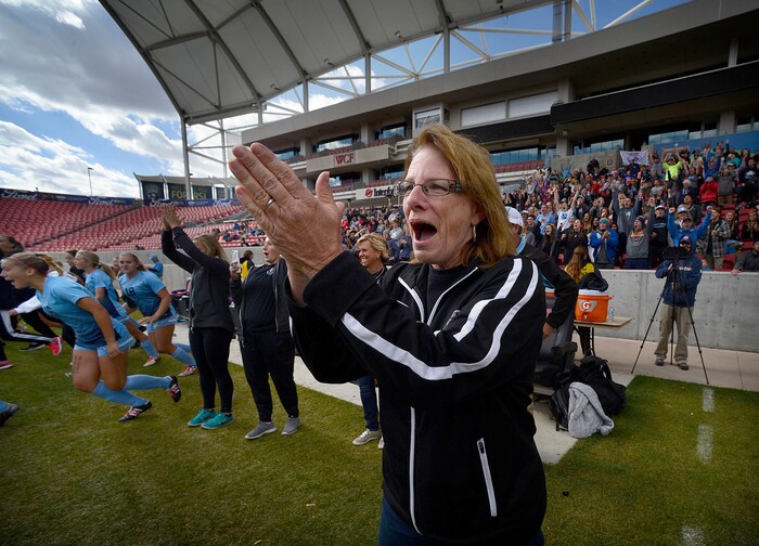 (Scott Sommerdorf | The Salt Lake Tribune)
Sky View head coach Sharron Wood applauds as her team wraps up the win in the closing seconds. Sky View defeated Bonneville 2-0 to win the 4A title game, Saturday, October 21, 2017.