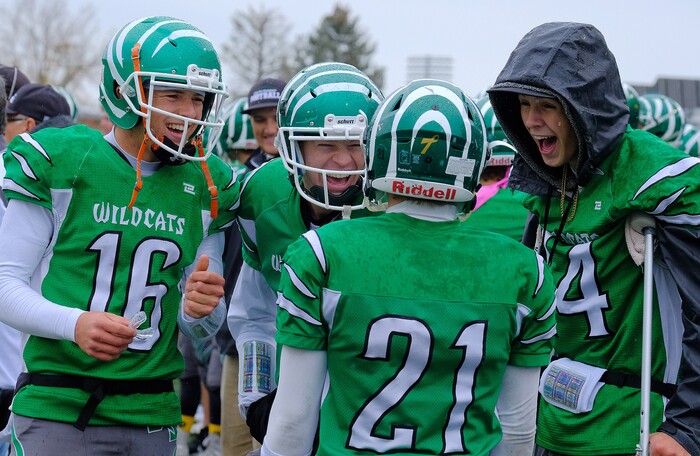 (Leah Hogsten  |  The Salt Lake Tribune)  South Summit's l-r Kael Atkinson, Hunter Fillmore and Jackson Lassche share a laugh with Cole Reidhead.   South Summit High School boys' football team defeated Grand County High School 47-9 during their class 2A state semifinal football game Saturday, November 4, 2017 at Weber State University's Stewart Stadium.