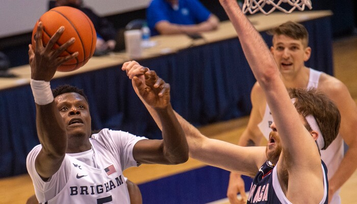 (Rick Egan | The Salt Lake Tribune)  Brigham Young Cougars forward Gideon George (5) shoots over Gonzaga Bulldogs forward Drew Timme (2), in West Coast Conference Basketball action between the Brigham Young Cougars and the Gonzaga Bulldogs at the Marriott Center in Provo, on Monday, Feb. 8, 2021.