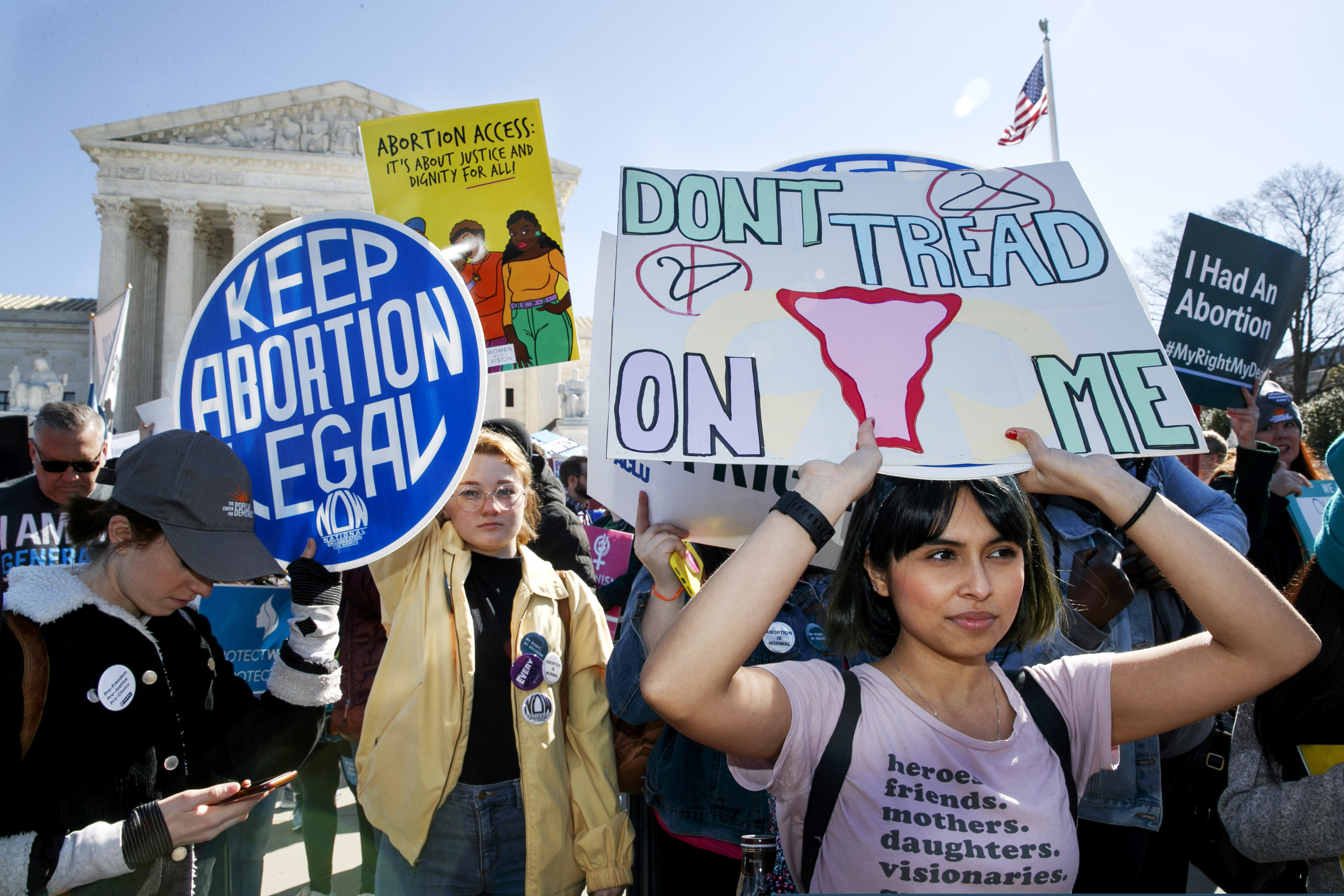 FILE - In this Wednesday, March 4, 2020 file photo, abortion rights demonstrators rally outside the Supreme Court in Washington.  (AP Photo/Jacquelyn Martin File)